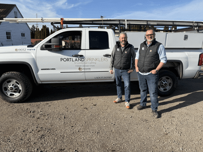 Dean and Bryan by Portland Sprinkler and Lighting company truck